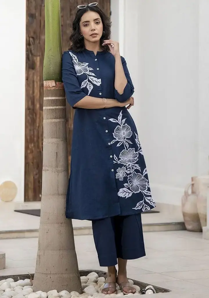 Blue linen co-ord set featuring a short kurta and straight-leg pants
